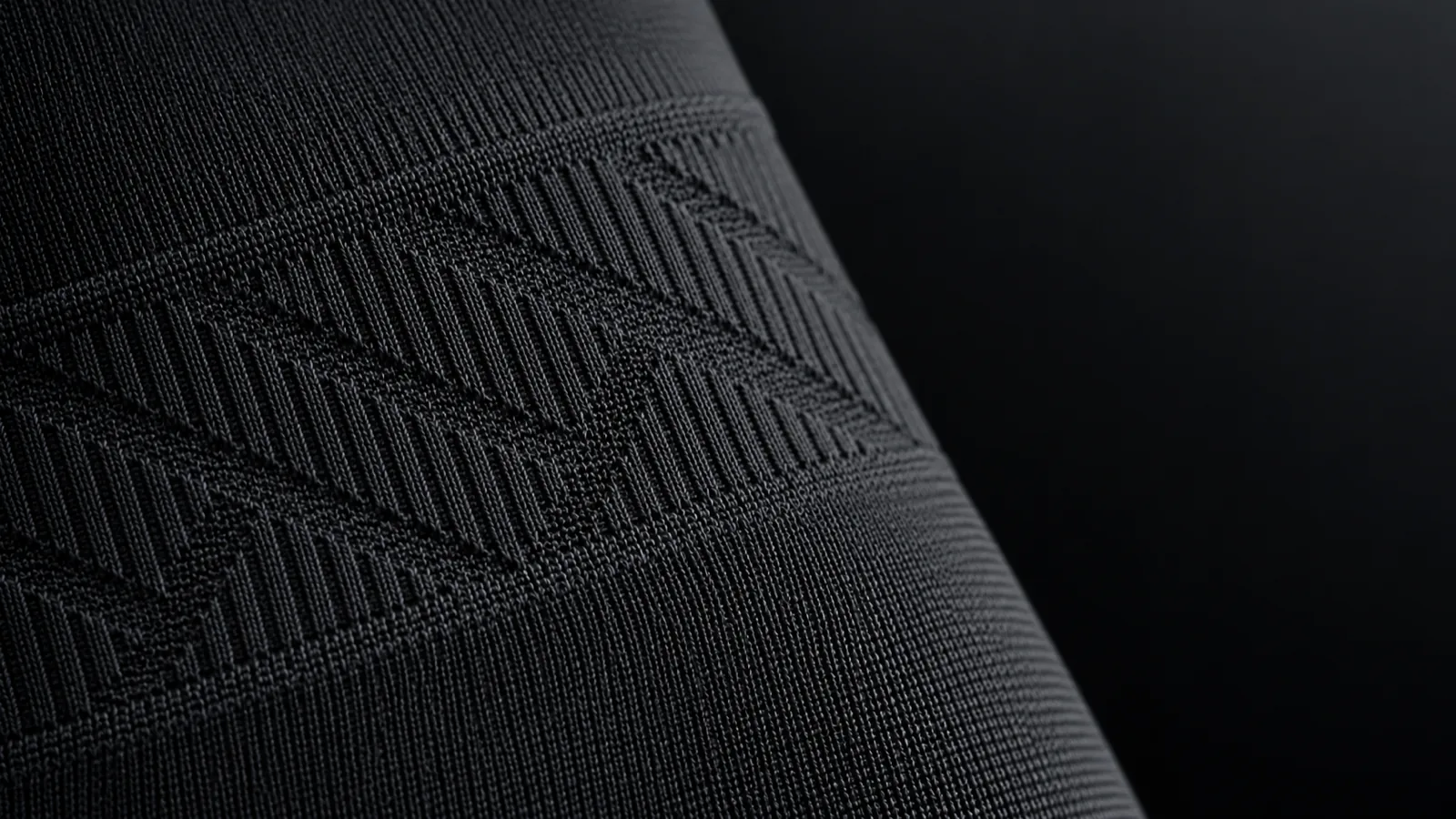 Macro of an abstract jacquard pattern knitted into seamless fabric, not printed