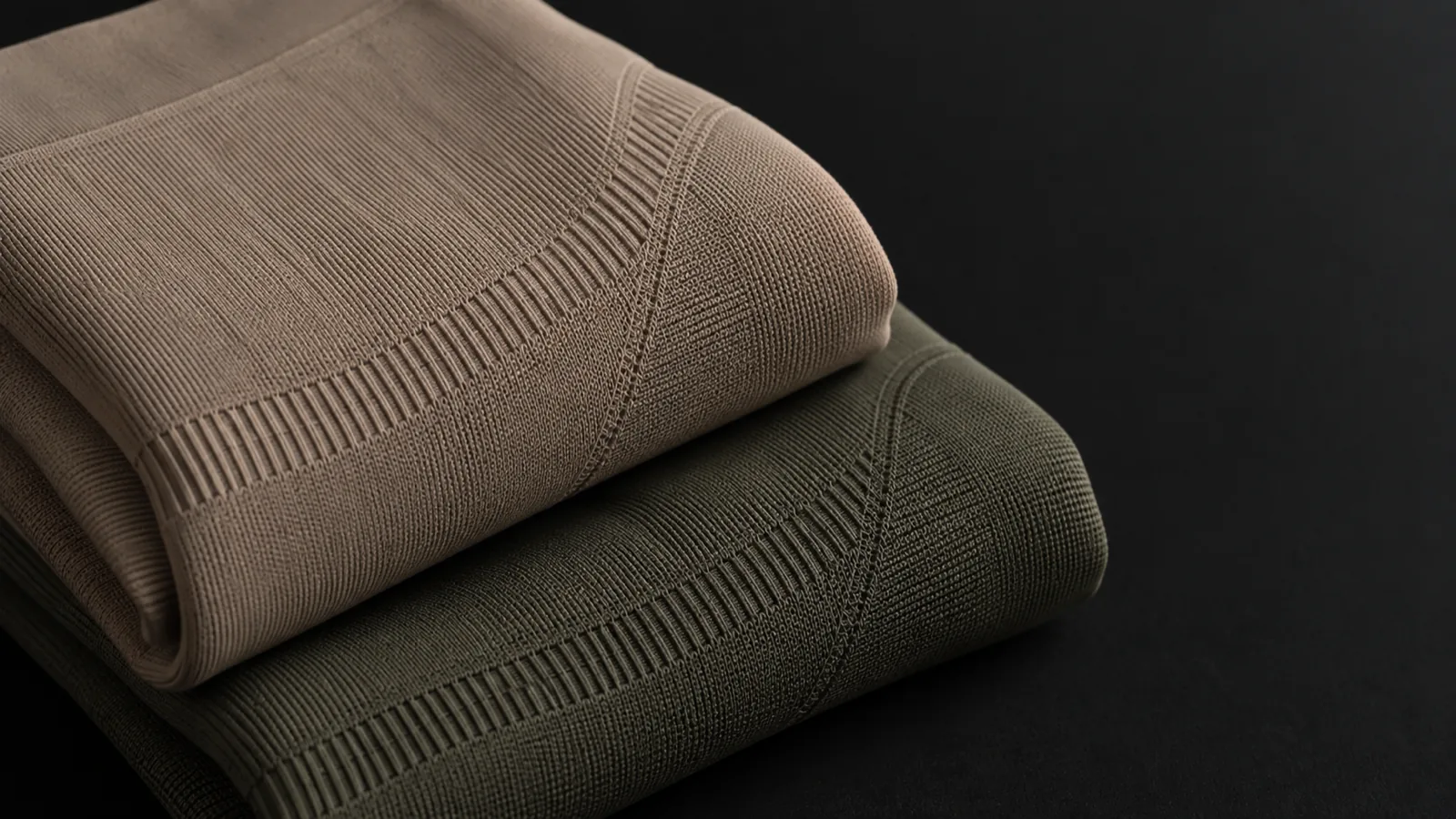 Two folded seamless fabric panels in a matched set colourway, same knit structure