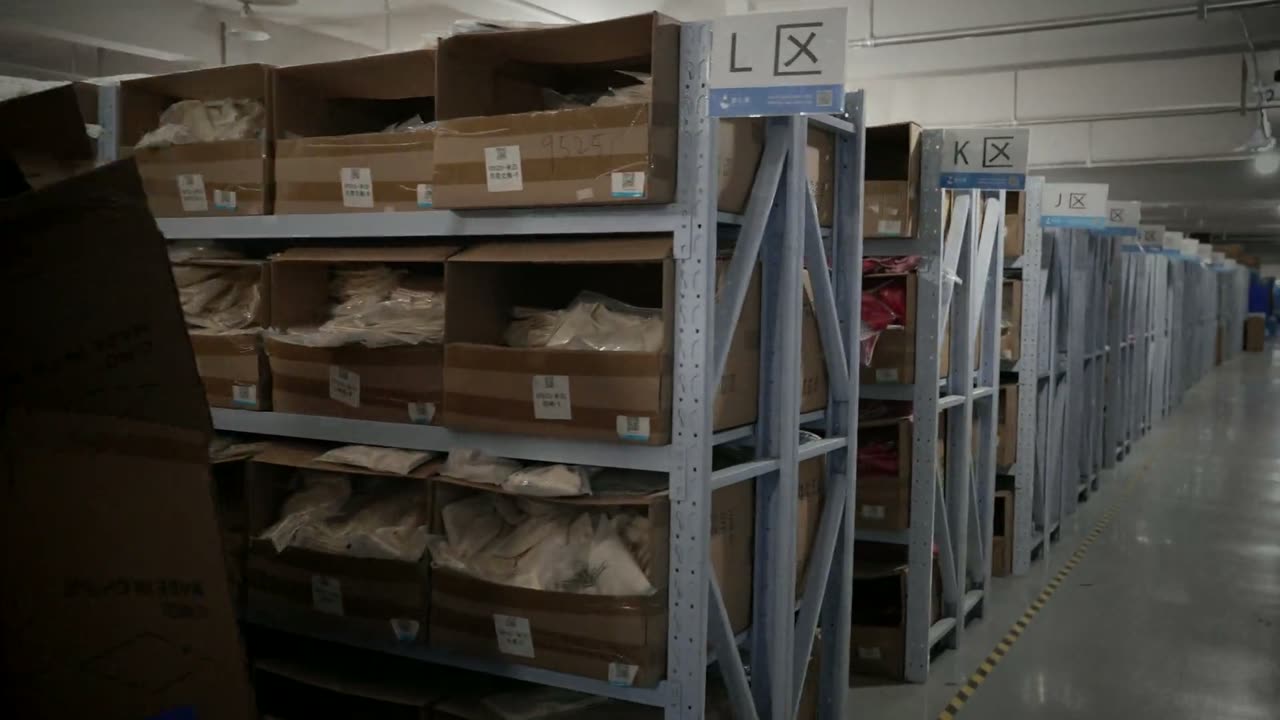 Packed orders on warehouse shelves, ready to ship