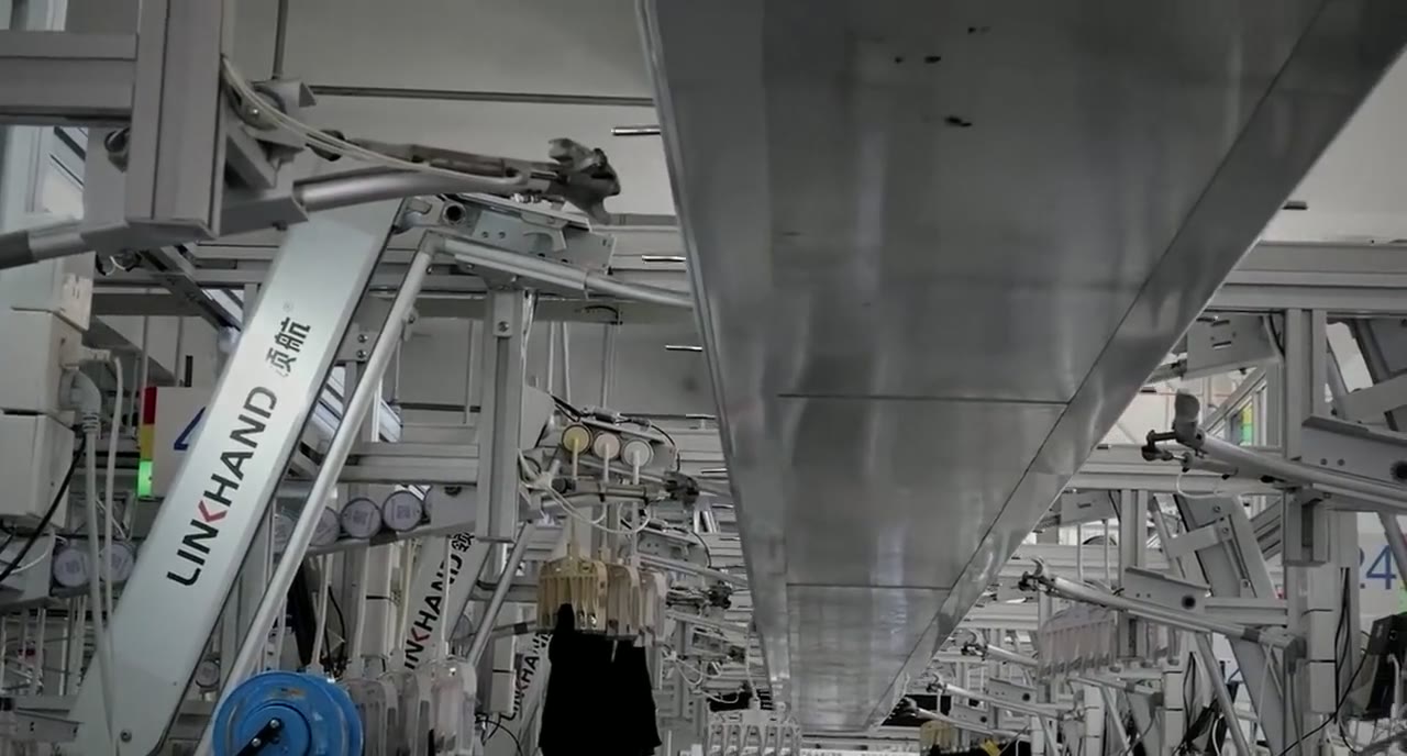 Automated hanger line moving garments through production