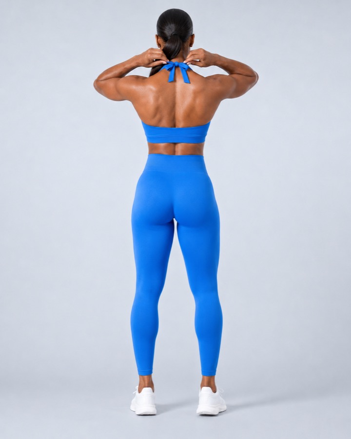 Seamless halter training top and high-waist leggings set in royal blue